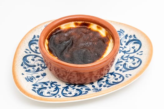 Traditional turkish dessert bakery rice pudding Turkish name Firin Sutlac in ceramic bowl