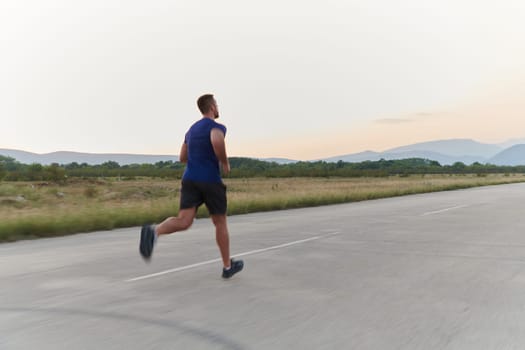 A highly motivated marathon runner displays unwavering determination as he trains relentlessly for his upcoming race, fueled by his burning desire to achieve his goals.