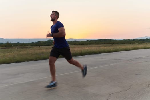 A highly motivated marathon runner displays unwavering determination as he trains relentlessly for his upcoming race, fueled by his burning desire to achieve his goals.