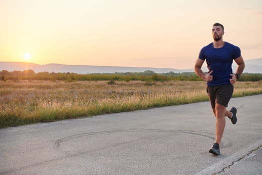 A highly motivated marathon runner displays unwavering determination as he trains relentlessly for his upcoming race, fueled by his burning desire to achieve his goals.