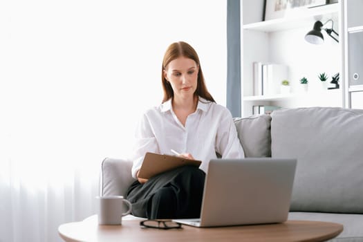 Psychologist woman in clinic office professional portrait with friendly smile feeling inviting for patient to visit the psychologist. The experienced and confident psychologist is utmost specialist