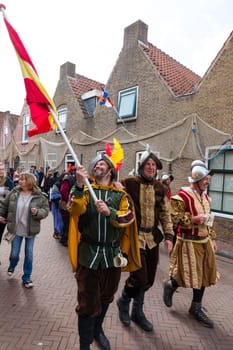 Brielle,Holland,1-04-2024:people with the spanish flag in traditional traditional costumes celebration of the the first town to be liberated from the Spanish in Den Briel in the Netherlands in 1572