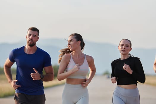 A group of friends maintains a healthy lifestyle by running outdoors on a sunny day, bonding over fitness and enjoying the energizing effects of exercise and nature.