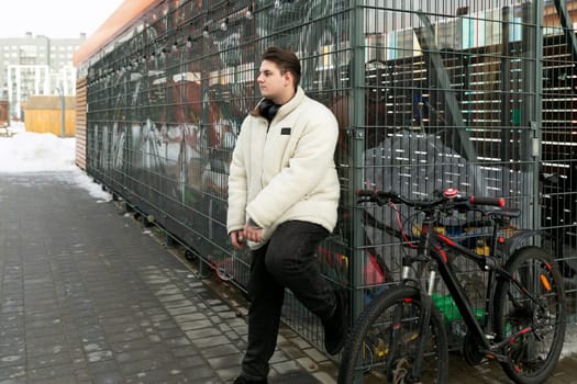 Lifestyle concept, young man riding a bicycle on the street.