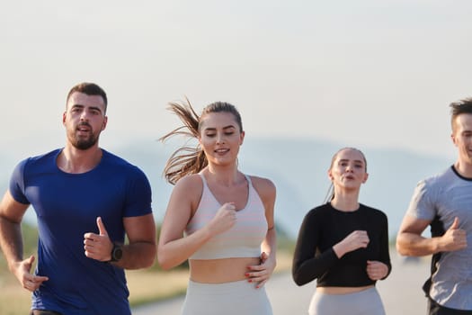 A group of friends maintains a healthy lifestyle by running outdoors on a sunny day, bonding over fitness and enjoying the energizing effects of exercise and nature.