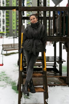 European young woman enjoying a walk in the playground.