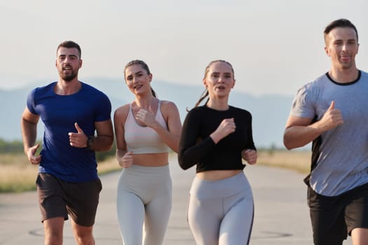 A group of friends maintains a healthy lifestyle by running outdoors on a sunny day, bonding over fitness and enjoying the energizing effects of exercise and nature.