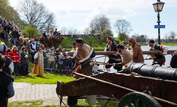 Brielle,Holland,1-04-2024:the highlight of the celebration of the liberation of Den Briel, the storming of the gate the first town to be liberated from the Spanish in Den Briel in 1572