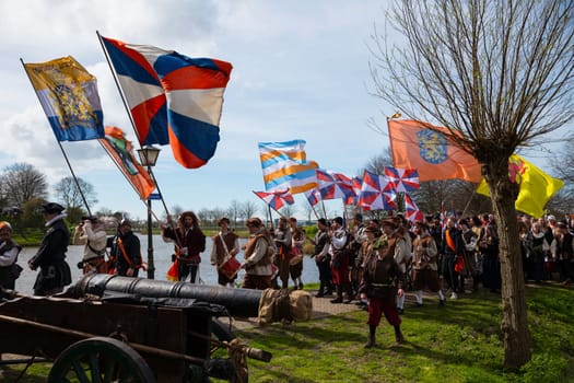 Brielle,Holland,1-04-2024:the highlight of the celebration of the liberation of Den Briel, the storming of the gate the first town to be liberated from the Spanish in Den Briel in the in 1572
