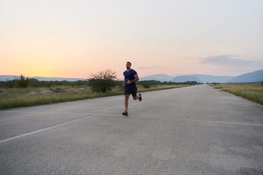 A highly motivated marathon runner displays unwavering determination as he trains relentlessly for his upcoming race, fueled by his burning desire to achieve his goals.