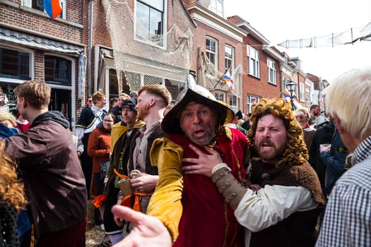 Brielle,Holland,1-04-2024:people in traditional traditional costumes celebration of the the first town to be liberated from the Spanish in Den Briel in the Netherlands in 1572