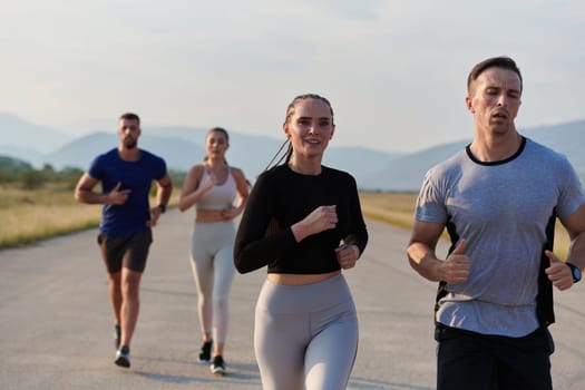 A group of friends maintains a healthy lifestyle by running outdoors on a sunny day, bonding over fitness and enjoying the energizing effects of exercise and nature.