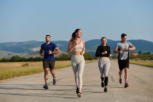 A group of friends maintains a healthy lifestyle by running outdoors on a sunny day, bonding over fitness and enjoying the energizing effects of exercise and nature.