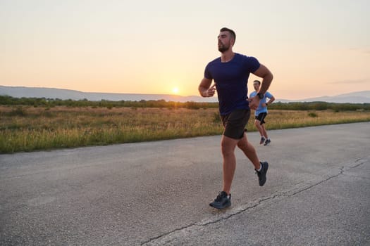 In anticipation of an upcoming marathon competition, two athletic friends train side by side, embodying the spirit of teamwork, dedication, and mutual support in their shared fitness journey.