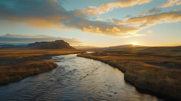 A serene natural landscape with a river flowing through a field at sunset, reflecting the colorful clouds in the sky as dusk settles over the horizon