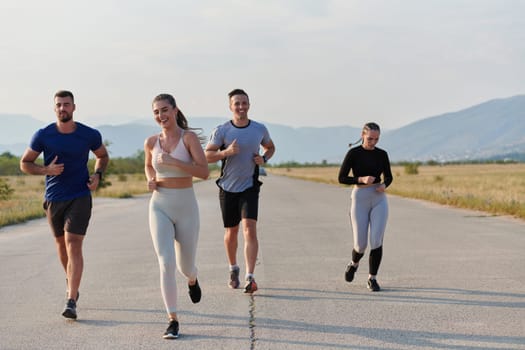 A group of friends maintains a healthy lifestyle by running outdoors on a sunny day, bonding over fitness and enjoying the energizing effects of exercise and nature.