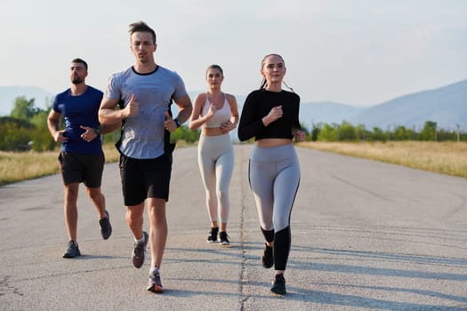 A group of friends maintains a healthy lifestyle by running outdoors on a sunny day, bonding over fitness and enjoying the energizing effects of exercise and nature.