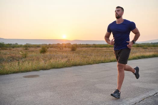 A highly motivated marathon runner displays unwavering determination as he trains relentlessly for his upcoming race, fueled by his burning desire to achieve his goals.