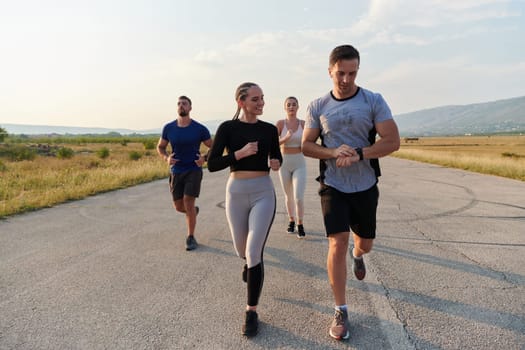 A group of friends maintains a healthy lifestyle by running outdoors on a sunny day, bonding over fitness and enjoying the energizing effects of exercise and nature.