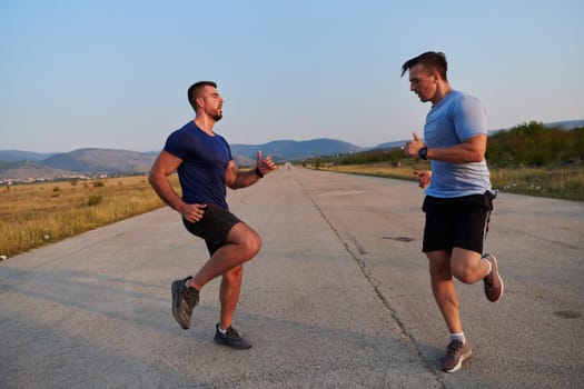 In anticipation of an upcoming marathon competition, two athletic friends train side by side, embodying the spirit of teamwork, dedication, and mutual support in their shared fitness journey.