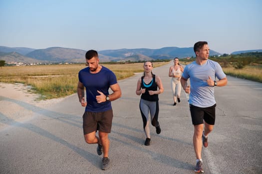 A group of friends maintains a healthy lifestyle by running outdoors on a sunny day, bonding over fitness and enjoying the energizing effects of exercise and nature.