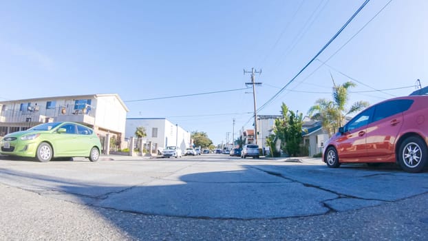 Santa Maria, California, USA-December 6, 2022-Car driving through the streets of Pismo Beach town, California during winter.