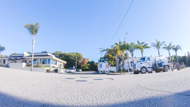 Santa Maria, California, USA-December 6, 2022-Car driving through the streets of Pismo Beach town, California during winter.