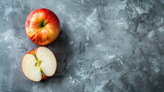 Sliced apple and whole apples on a textured gray background AI