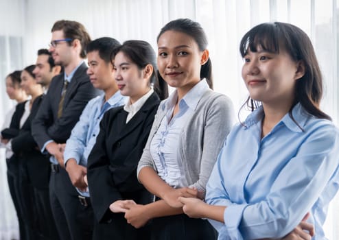 Modern diversity and multicultural company, business people joining hand together and standing in line, shared commitment to collaboration and cooperation concept background. Meticulous