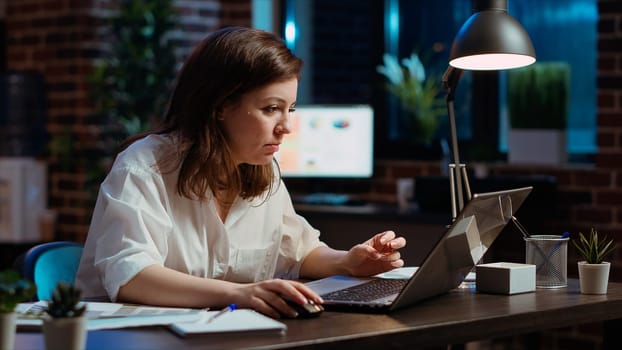 Office clerk wincing at laptop screen, unable to believe disappointing negative response received from client while discussing business matters. Worker doing upset face grimace, feeling annoyed