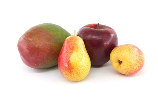 Fresh whole multicolored ripe mango, pears and red apple fruits isolated on white background