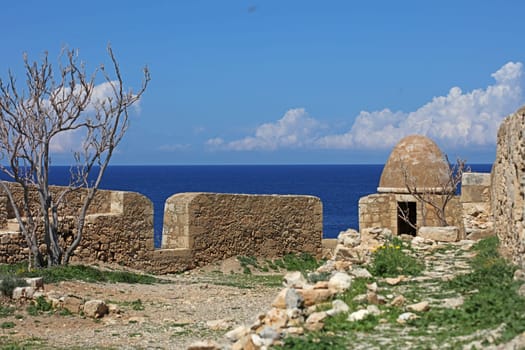 Fortezza fortress castle in Crete island holidays exploring the old ancient stone city monuments close up summer background carnival season high quality big size printings