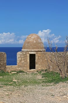 Fortezza fortress castle in Crete island holidays exploring the old ancient stone city monuments close up summer background carnival season high quality big size printings