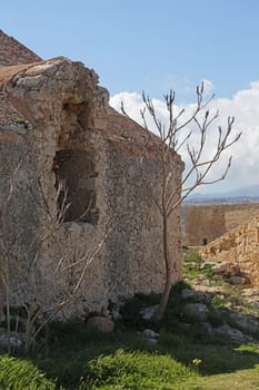 Fortezza fortress castle in Crete island holidays exploring the old ancient stone city monuments close up summer background carnival season high quality big size printings