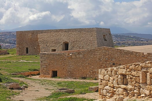 Fortezza fortress castle in Crete island Rethimno holidays exploring the old ancient stone city monuments close up summer background carnival season high quality big size printings