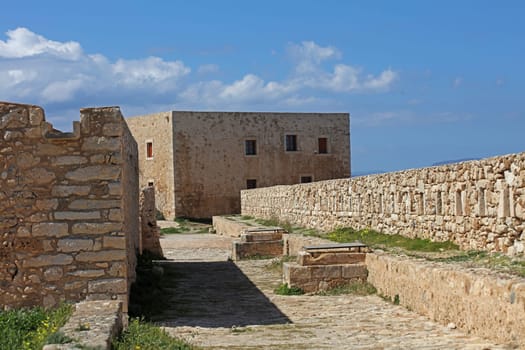 Fortezza fortress castle in Crete island Rethimno holidays exploring the old ancient stone city monuments close up summer background carnival season high quality big size printings