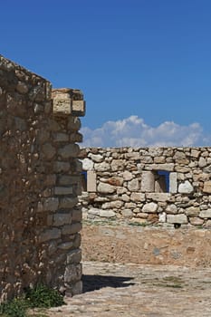 Fortezza fortress castle in Crete island Rethimno holidays exploring the old ancient stone city monuments close up summer background carnival season high quality big size printings