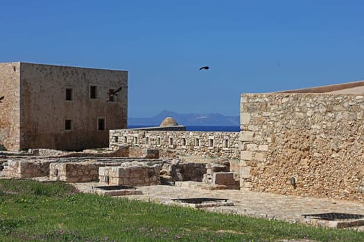 Fortezza fortress castle in Crete island Rethimno holidays exploring the old ancient stone city monuments close up summer background carnival season high quality big size printings
