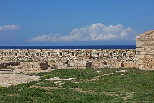 Fortezza fortress castle in Crete island Rethimno holidays exploring the old ancient stone city monuments close up summer background carnival season high quality big size printings