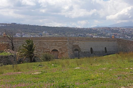 Fortezza fortress castle in Crete island Rethimno holidays exploring the old ancient stone city monuments close up summer background carnival season high quality big size printings