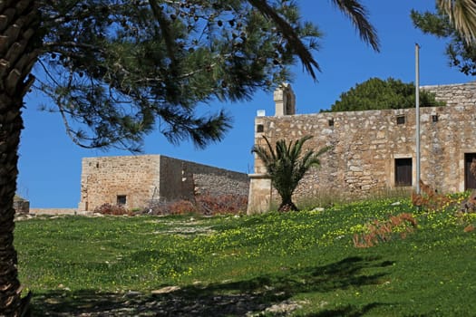 Fortezza fortress castle in Crete island Rethimno holidays exploring the old ancient stone city monuments close up summer background carnival season high quality big size printings