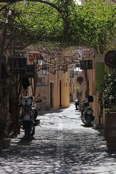 Rethimnon, Greece, Friday 15 March 2024 Crete island holidays exploring the old ancient stone city roads close up summer background carnival season high quality big size printings