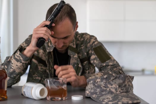 Upset young man drinker alcoholic sitting at bar counter with glass drinking whiskey alone, sad depressed addicted drunk guy having problem suffer from alcohol addiction abuse, alcoholism concept. High quality photo