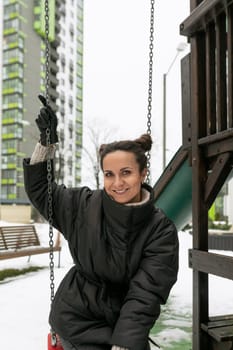 European young woman enjoying a walk in the playground.