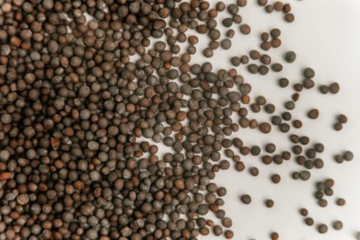 Brown Mustard Seeds Also Know as Rai Spice Background