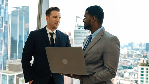 Ornamented office overlooking city skyline, diversity corporate professional discuss ambitious business expansion or strategic marketing. Financial advisor give consulting business insights and idea