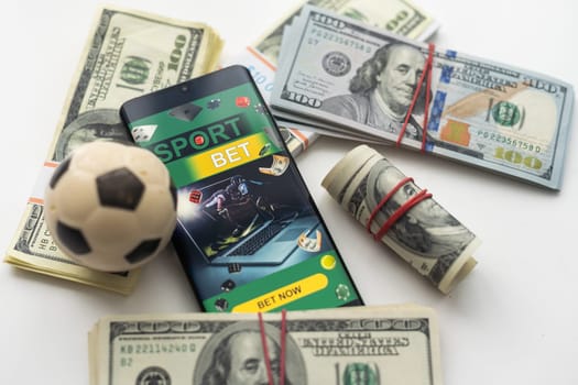 Money and soccer ball - sport and business background. High quality photo