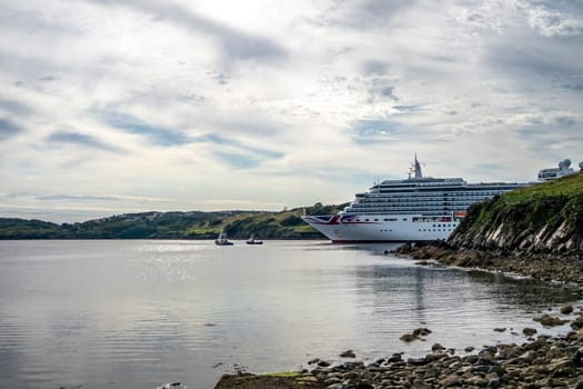 KILLYBEGS, IRELAND - MAY 16 2023: The Norwegian Star leaving after visiting Killybegs.