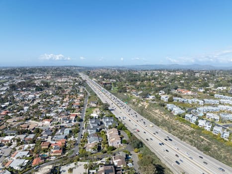 Aerial view of highway transportation with small traffic, highway interchange and junction, San Diego Freeway interstate 5, California