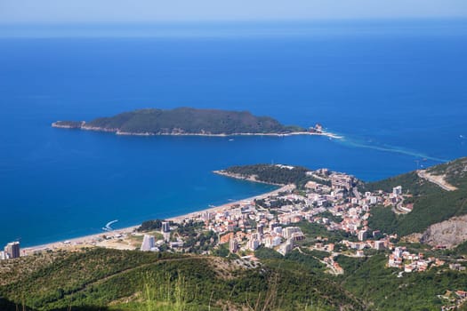 View of the city from the top of the mountain road. View of the coast and the city of Budva Riviera. Montenegro, Balkans, Adriatic Sea, Europe